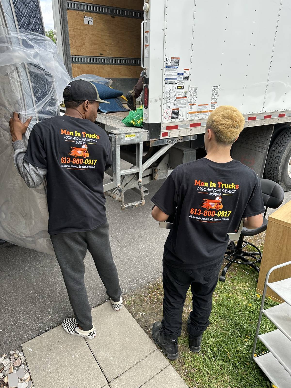 Men In Trucks crew loading household items for a Cornwall to Montreal move
