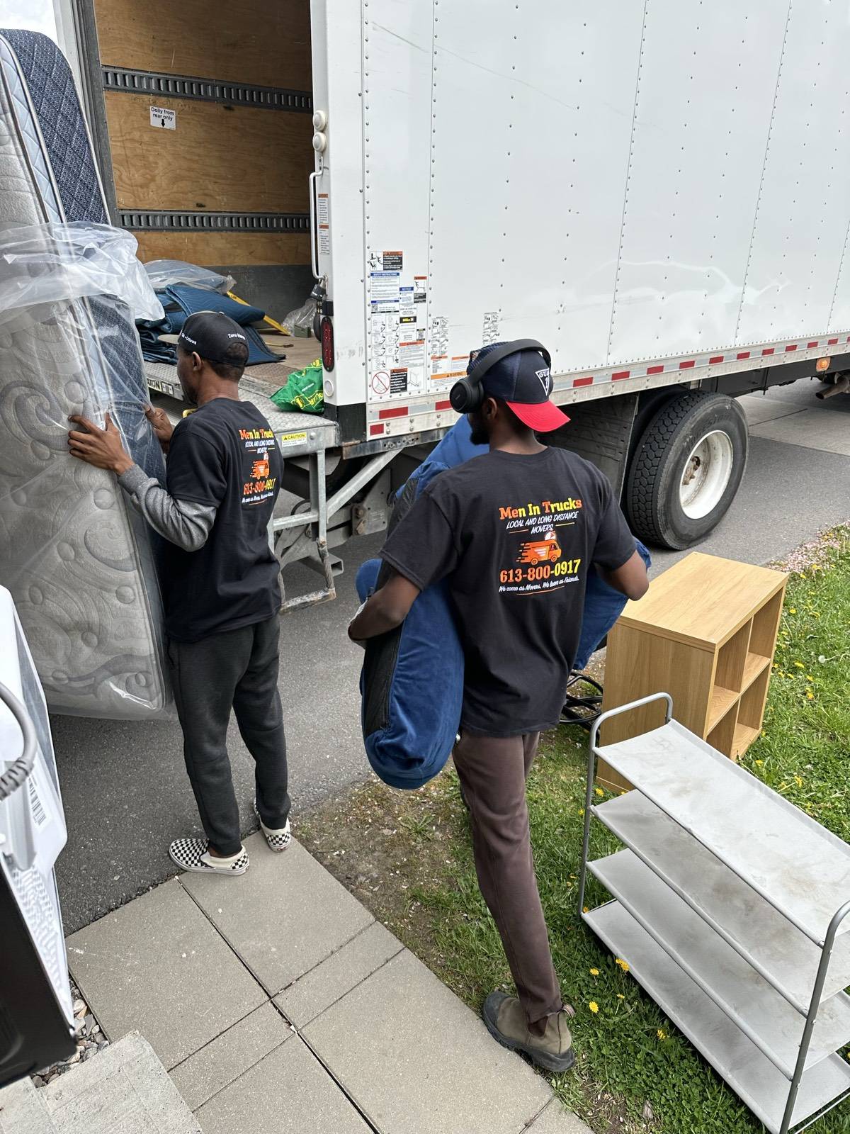 Men In Trucks crew loading a truck on short notice in Ottawa